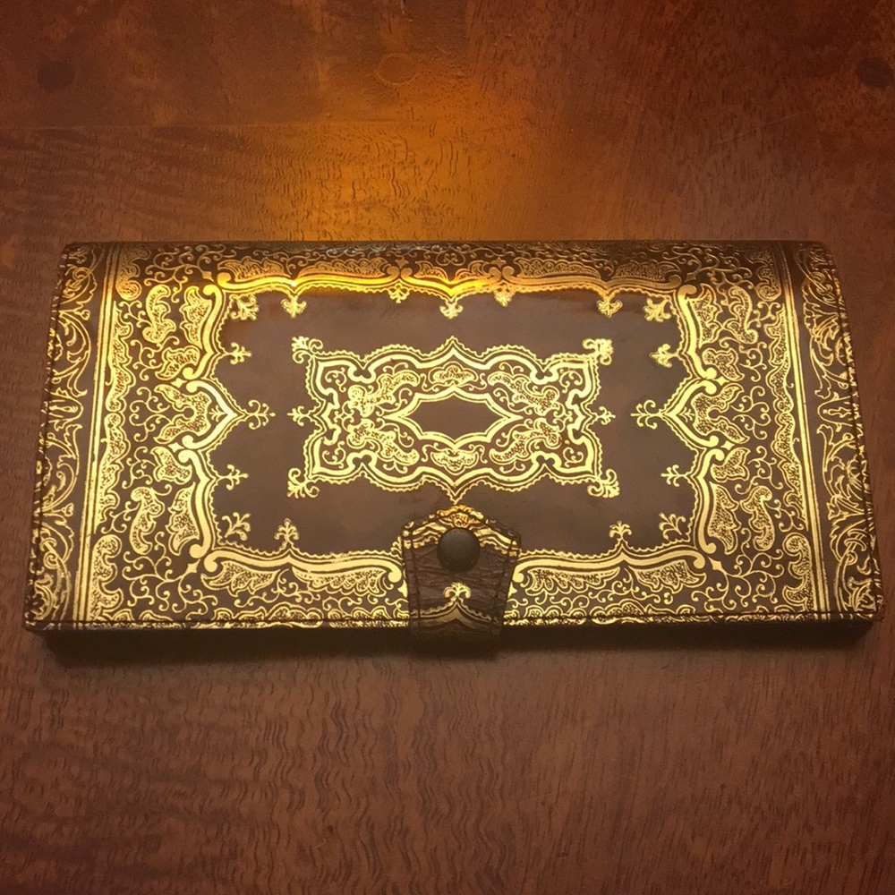 Ornate vintage leather wallet with change purse